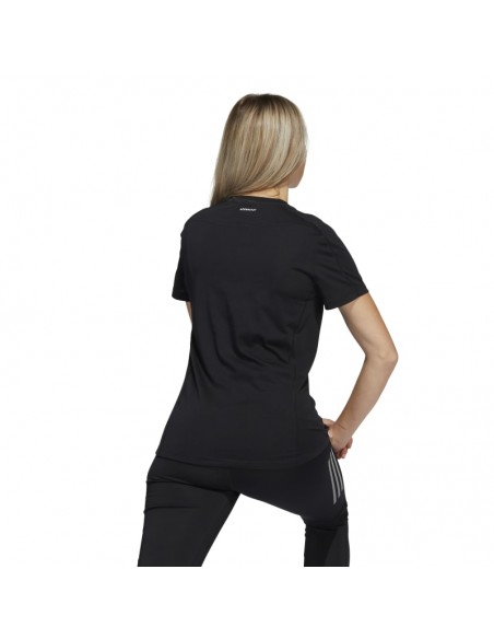 Camiseta de running de manga corta de la marca Adidas para mujer. Vista espalda.