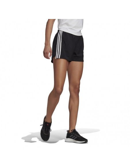 Shorts para hacer deporte de la marca Adidas para mujer, con diseño de 3 bandas en los laterales. Vista lateral.