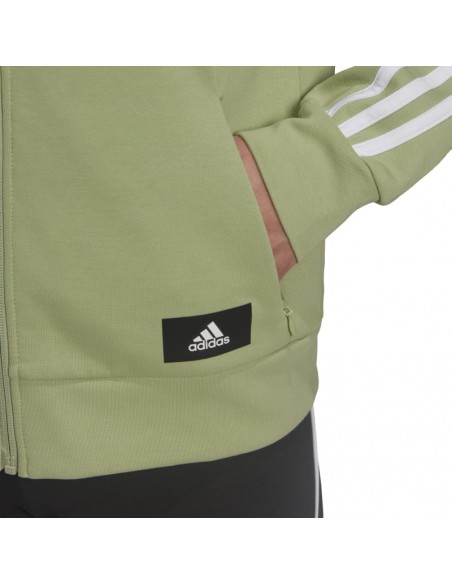 Sudadera de la marca Adidas para mujer con bolsillos laterales y cierre de cremallera. Vista bolsillos.