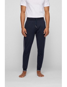 Navy blue sports tracksuit pants with a classic cut from the Boss brand. Cover view.