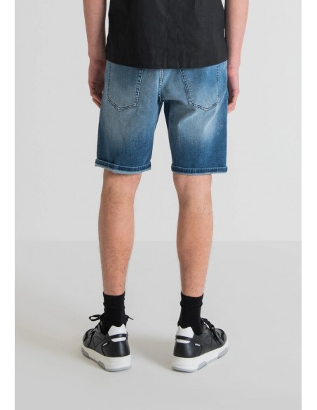 Elastic denim shorts for men from the Antony Morato brand. Back view.