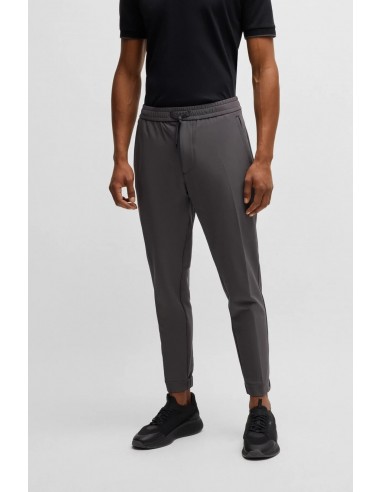 Tapered fit trousers in...